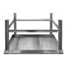 A SSL Industries stainless steel work table with paw print footing and metal frame.