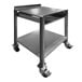 A stainless steel metal receiving desk on wheels.