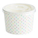 A white Choice paper cup with colorful polka dots.