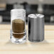 A Frieling USA silver salt shaker.