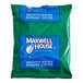 A green package of Maxwell House Original Roast Decaf coffee with blue and white text.