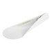 A white EcoTensil compostable paper tasting spoon with a green handle.