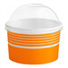 A orange and white container with a clear dome lid.