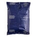 A blue plastic bag of Maxwell House Special Delivery coffee filters with white text.