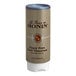 A brown Monin container of Sugar-Free Dark Chocolate Flavoring Sauce with a blue lid.