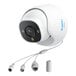 A white Reolink dome camera with a black circle and wires.