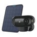 A Reolink solar-powered camera next to a solar panel.