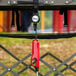 A red and black KEY-BAK Cool-Bak cooler tether with a red hook.