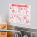 A white rectangular sign with red text that says "Wash Your Hands" above a sink.