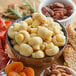 A bowl of marinated mushrooms.