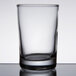 An Anchor Hocking Regency side water sampler glass on a table.