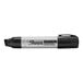 A close up of a Sharpie Magnum black permanent marker with a silver tip.