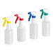 A row of Lavex white plastic bottles with assorted color spray triggers including blue, green, yellow, and white.