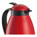 A red and black Cilio Imola insulated carafe.