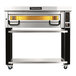 A PizzaMaster electric pizza oven with a stand on wheels.