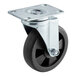 An Avantco swivel plate caster with a metal wheel and black rubber tire.