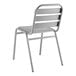 A Lancaster Table & Seating silver powder-coated steel outdoor side chair with a gray seat and back.