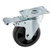 A black and silver swivel plate caster with a metal wheel and brake.