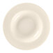 A white RAK Porcelain bone china plate with a circular rim and center.