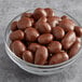 A bowl of Albanese milk chocolate covered raisins.
