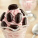 A close up of Albanese dark chocolate covered almonds.