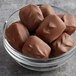 A bowl of Albanese milk chocolate covered peanut butter meltaways.