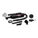 A black MetroVac handheld canister vacuum with filter and accessories.