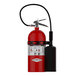 Amerex fire extinguisher with a red container and black hose.