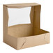 A Southern Champion cardboard bakery box with a window.