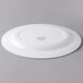 A white Libbey oval platter with a circular design on the rim.