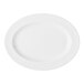A white oval porcelain platter with a wide rim.