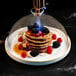 A stack of pancakes with berries in a Flavour Blaster Large Food Cloche.