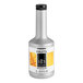 A silver bottle of 1883 Maison Routin Mango Puree with a white label and black cap.