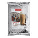 A white bag of Cappuccine Supreme Spiced Chai Frappe Mix.