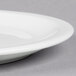 A Libbey round white porcelain plate with a narrow rim.