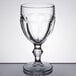 A close-up of a clear Libbey Gibraltar goblet with a stem.