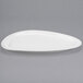 A white Libbey Slenda Triform Royal Rideau porcelain plate with an oval shape and white rim.