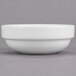 A close up of a Libbey Royal Rideau white porcelain fruit bowl.