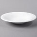 A white Libbey Slenda bowl on a gray surface.