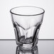 A Libbey Gibraltar Twist Rocks glass on a table.