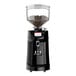 A Victoria Arduino black espresso grinder with a clear container full of coffee beans.