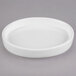 A white Libbey Royal Rideau stacking oval bowl on a white surface.