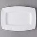 A white rectangular Libbey Slenda porcelain plate with a wide rim.