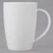 A close-up of a Libbey white porcelain mug with a handle.