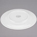 A white Libbey porcelain plate with a wide circular rim.