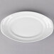 A white Libbey oval platter with curved edges and a porcelain handle.