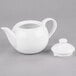 A white Libbey porcelain tea pot with a round lid.