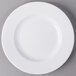 A white Libbey Slenda wide rim porcelain plate.