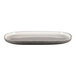 A white oval RAK Porcelain serving plate with a gray speckled rim.