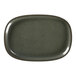 A close-up of a dark grey RAK Porcelain oval plate with a brown rim.